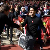  Mikel Arteta the Arsenal Manager shakes hands with the Tottenham Manager Antonio Conte before the Premier League match (Photo by David Price/Arsenal FC via Getty Images)