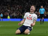 r Dejan Kulusevski celebrates after creating their fourth goal during the English Premier League football match  (Photo by ISABEL INFANTES/AFP via Getty Images)