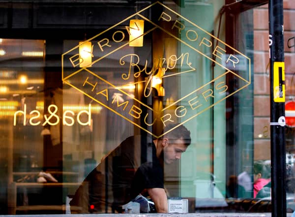 A Byron hamburgers restaurant is pictured in central London.  (Photo by Tolga AKMEN / AFP)    