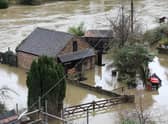 Houses in Ironbridge surrounded by flood waters as River Severn levels started to rise following heavy rain.