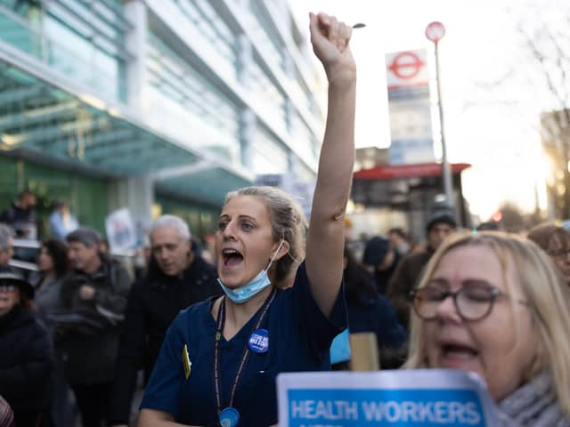 Nurses and supporters gather outside University College Hospital before marching to Downing Street after a day of strike action on December 20 2022 in London. (Photo by Dan Kitwood/Getty Images)