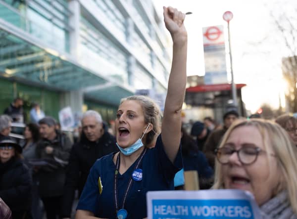 Nurses and supporters gather outside University College Hospital before marching to Downing Street after a day of strike action on December 20 2022 in London. (Photo by Dan Kitwood/Getty Images)