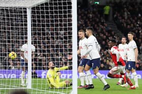 Hugo Lloris of Tottenham Hotspur scores an own goal during the Premier League match between Tottenham Hotspur and Arsenal FC at Tottenham Hotspur Stadium on January 15, 2023 in London, England. (Photo by Catherine Ivill/Getty Images)