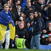 Chelsea's Ukrainian midfielder Mykhailo Mudryk is introduced to the crowd at half-time in the English Premier League football match (Photo by BEN STANSALL/AFP via Getty Images)