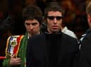 Oasis singer Liam Gallagher say brother Noel phoned him “begging for forgiveness”.