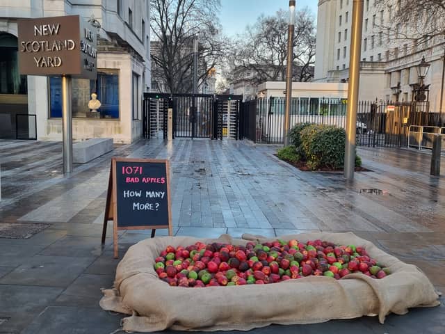 Women’s charity Refuge has placed 1,071 ‘bad apples’ outside the Met Police HQ in London. Photo: LondonWorld
