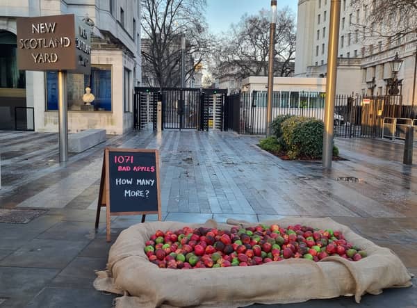 Women’s charity Refuge has placed 1,071 ‘bad apples’ outside the Met Police HQ in London. Photo: LondonWorld