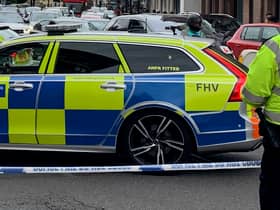 A Met Police officer at a cordon