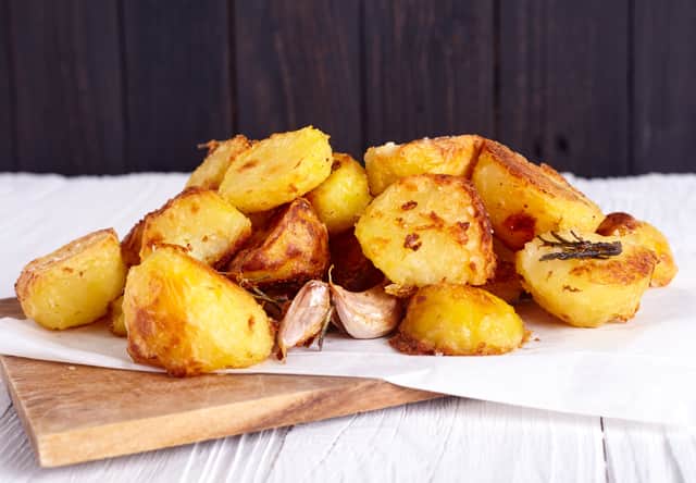 Perfect crispy roasted potatoes are a much-loved British delicacy available at Toby Carvery restaurants - Credit: Adobe