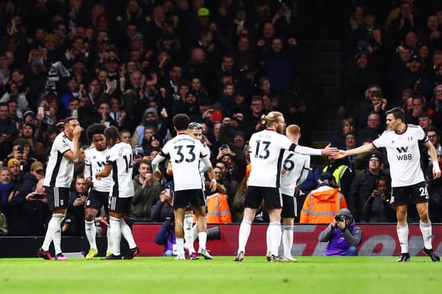 Fulham players celebrate.  