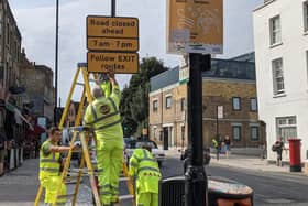 Traffic restriction signs going up in Stoke Newington’s Church Street in 2021