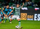 Sporting Lisbon's Spanish defender Pedro Porro shoots a penalty kick and scores his team's second goal during the Portuguese league football match between Sporting CP