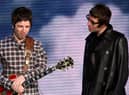 Liam And Noel Gallagher have been told to bury the hatchet as mum Peggy turns 80.