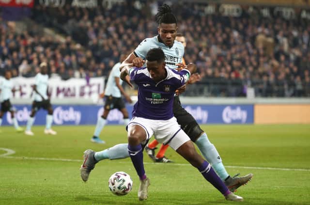 Albert Sambi Lokonga and Club's Simon Deli fight for the ball during a soccer game between RSCA Anderlecht and Club Brugge (Photo by VIRGINIE LEFOUR/BELGA MAG/AFP via Getty Images)