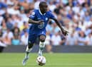 Chelsea's French midfielder N'Golo Kante runs with the ball during the English Premier League football match between Chelsea and Tottenham Hotspur at Stamford Bridge 