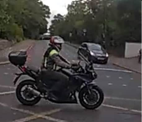 Police are looking for this motorcyclist, who may have witnessed a fatal collision.