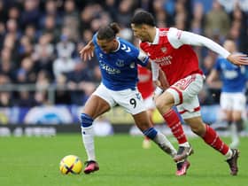 Dominic Calvert-Lewin of Everton is challenged by William Saliba of Arsenal during the Premier League match between Everton FC and Arsenal FC at Goodison Park on February 04, 2023 in Liverpool, England. (Photo by Clive Brunskill/Getty Images)