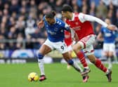 Dominic Calvert-Lewin of Everton is challenged by William Saliba of Arsenal during the Premier League match between Everton FC and Arsenal FC at Goodison Park on February 04, 2023 in Liverpool, England. (Photo by Clive Brunskill/Getty Images)