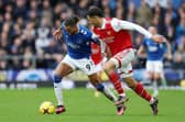 Dominic Calvert-Lewin of Everton is challenged by William Saliba of Arsenal during the Premier League match between Everton FC and Arsenal FC at Goodison Park on February 04, 2023 in Liverpool, England. (Photo by Clive Brunskill/Getty Images)