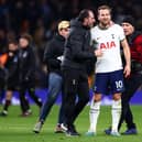 Cristian Stellini celebrates with Harry Kane of Tottenham Hotspur after the team’s victory during the Premier League match (Photo by Clive Rose/Getty Images)