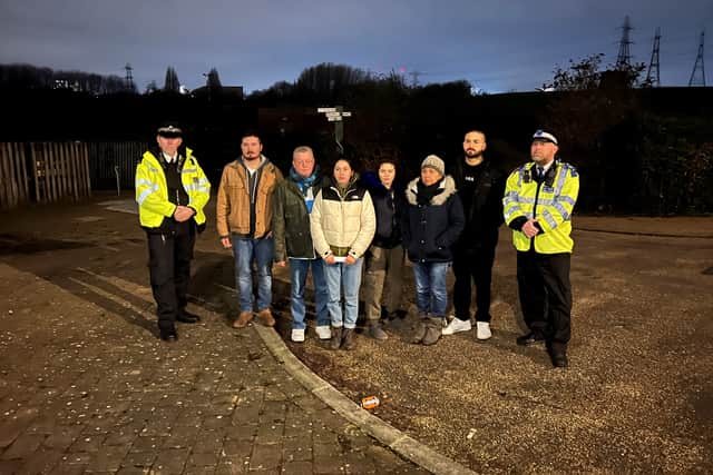 Officers with Nathan’s relatives on February 4.