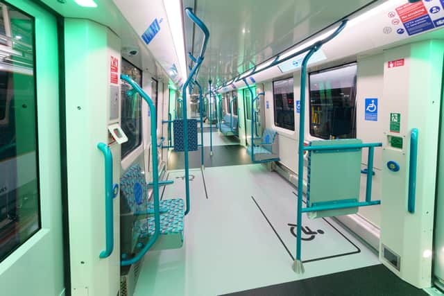 New DLR train interior with dedicated wheelchair areas. Credit: TfL