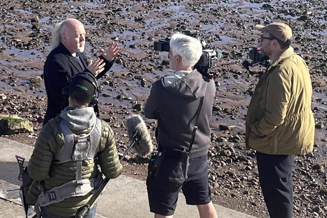 Bill Bailey was spotted filming a mystery show in a sunny seaside town.
