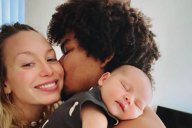 Karis Scarlette (left) with her husband  Crischarleson Borges (right) and their baby daughter Allegra. Credit: Karis Scarlette