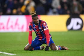 Wilfried Zaha of Crystal Palace reacts during the Premier League match between Crystal Palace and Manchester United at Selhurst  (Photo by Justin Setterfield/Getty Images)