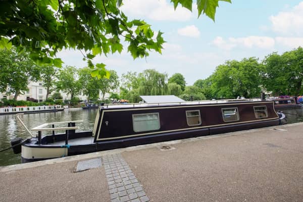 A modern houseboat near central London is on the property market for less than £43,000. 