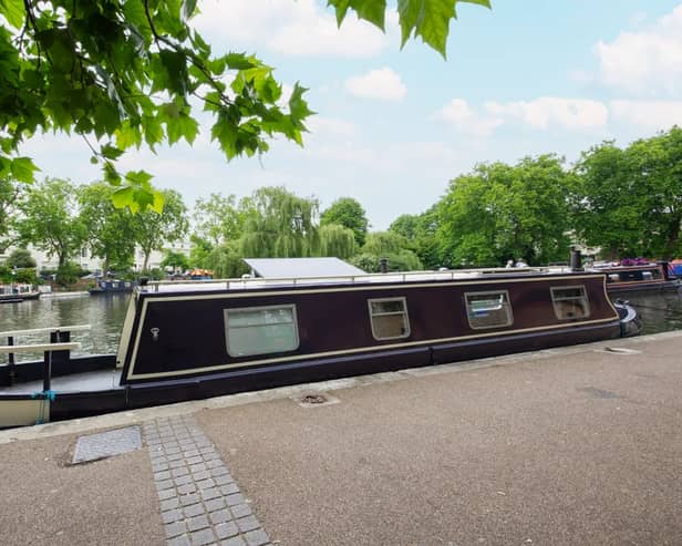 A modern houseboat near central London is on the property market for less than £43,000. 