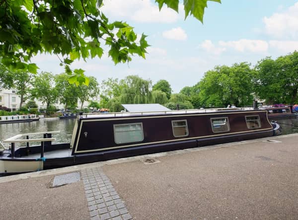 A modern houseboat near central London is on the property market for less than £43,000. 