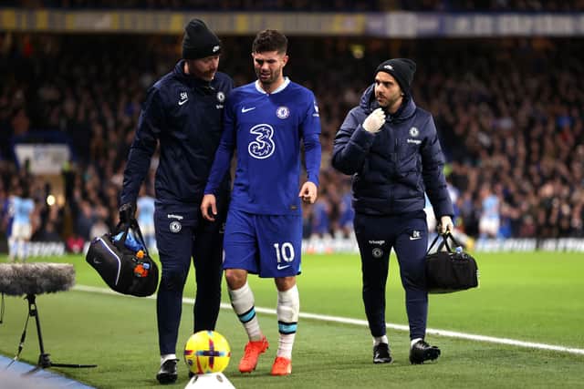 Christian Pulisic of Chelsea looks on after leaving the field following medical treatment, shortly before being replaced  (Photo by Ryan Pierse/Getty Images)