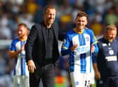  Graham Potter, Manager of Brighton & Hove Albion and Pascal Gross of Brighton & Hove Albion  (Photo by Bryn Lennon/Getty Images)