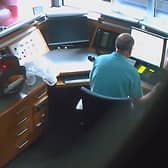 Footage from a covert camera inside the security kiosk at the British Embassy in Berlin shows David Ballantyne Smith recording embassy CCTV footage on his mobile phone.