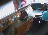 Footage from a covert camera inside the security kiosk at the British Embassy in Berlin shows David Ballantyne Smith recording embassy CCTV footage on his mobile phone.