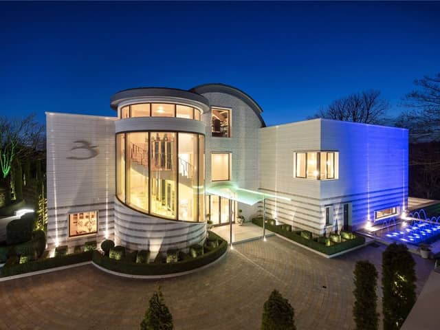 The property lit up at night