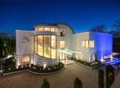 The property lit up at night