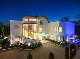 The property lit up at night