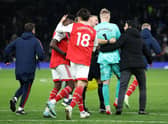 Arsenal goalkeeper Aaron Ramsdale was led away from the area after the attack. Credit: Getty Images