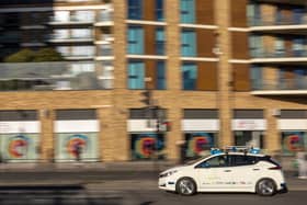 One of the self-driving Niassan Leaf vehicles in action 