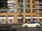 One of the self-driving Niassan Leaf vehicles in action 