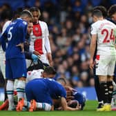  Cesar Azpilicueta of Chelsea lies injured during the Premier League match between Chelsea FC and Southampton FC (Photo by Justin Setterfield/Getty Images)