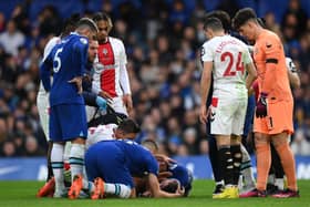 Cesar Azpilicueta of Chelsea lies injured during the Premier League match between Chelsea FC and Southampton FC (Photo by Justin Setterfield/Getty Images)