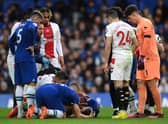  Cesar Azpilicueta of Chelsea lies injured during the Premier League match between Chelsea FC and Southampton FC (Photo by Justin Setterfield/Getty Images)