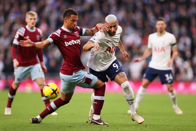 Richarlison is challenged by Thilo Kehrer. (Photo by Ryan Pierse/Getty Images)