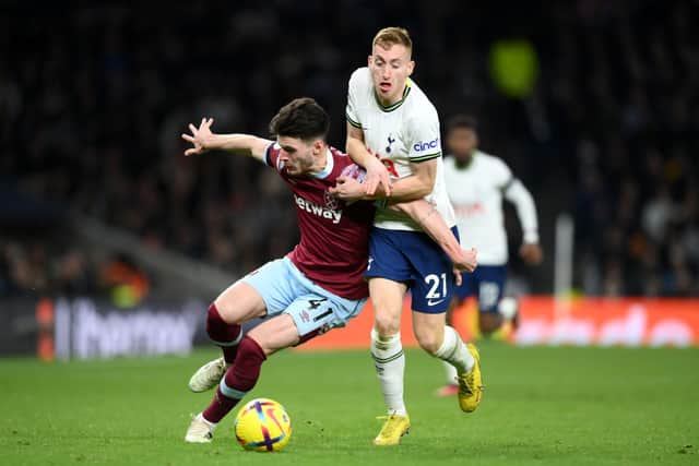 Dejan Kulusevski wrestles with Declan Rice. (Photo by Justin Setterfield/Getty Images)