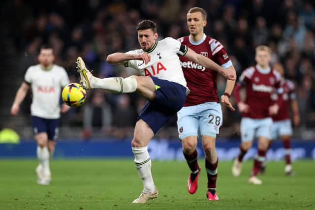 Clement Lenglet clears. (Photo by Ryan Pierse/Getty Images)