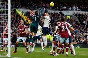 West Ham United’s Polish goalkeeper Lukasz Fabianski punches the ball to make a save during the English Premier League  (Photo by IAN KINGTON/AFP via Getty Images)