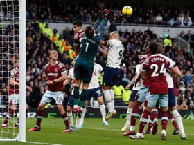 West Ham United’s Polish goalkeeper Lukasz Fabianski punches the ball to make a save during the English Premier League  (Photo by IAN KINGTON/AFP via Getty Images)